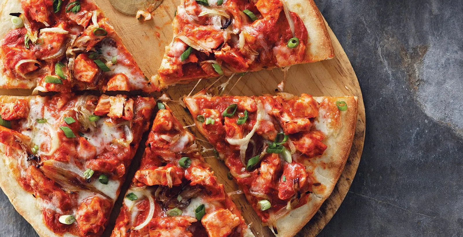 Best Butter Chicken Pizza in Calgary Calzones Wings & Salad, Calgary, AB