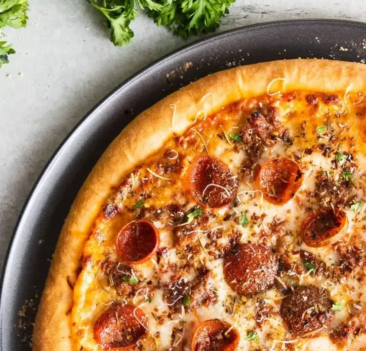 Best butter chicken pizza in Calgary Calzones Wings & Salad, Calgary, AB